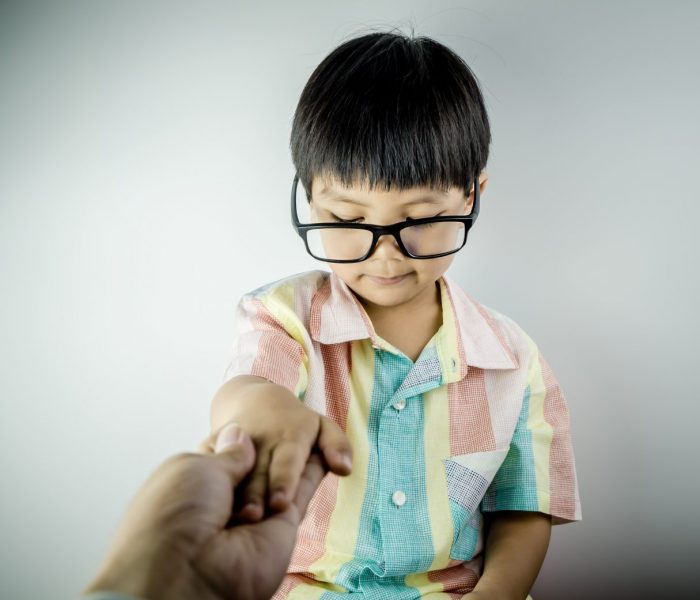 Boy is being pulled out while using Internet on Tablet