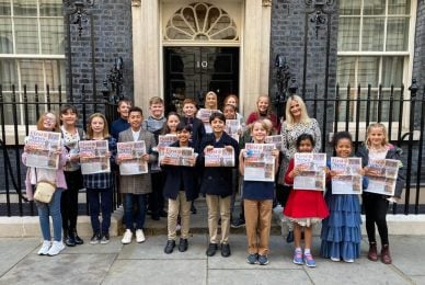 Children standing in front of 10 Downing Street